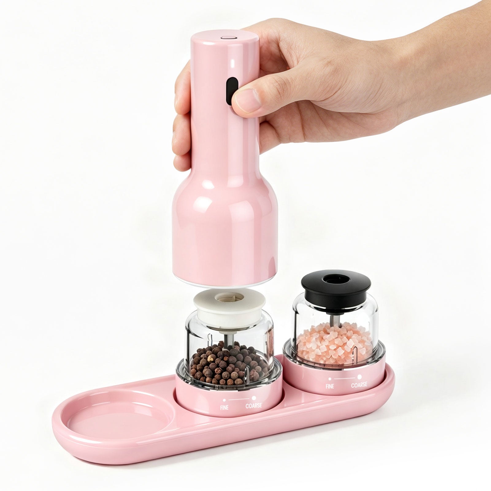 Pink pepper grinder with two compartments on a white background